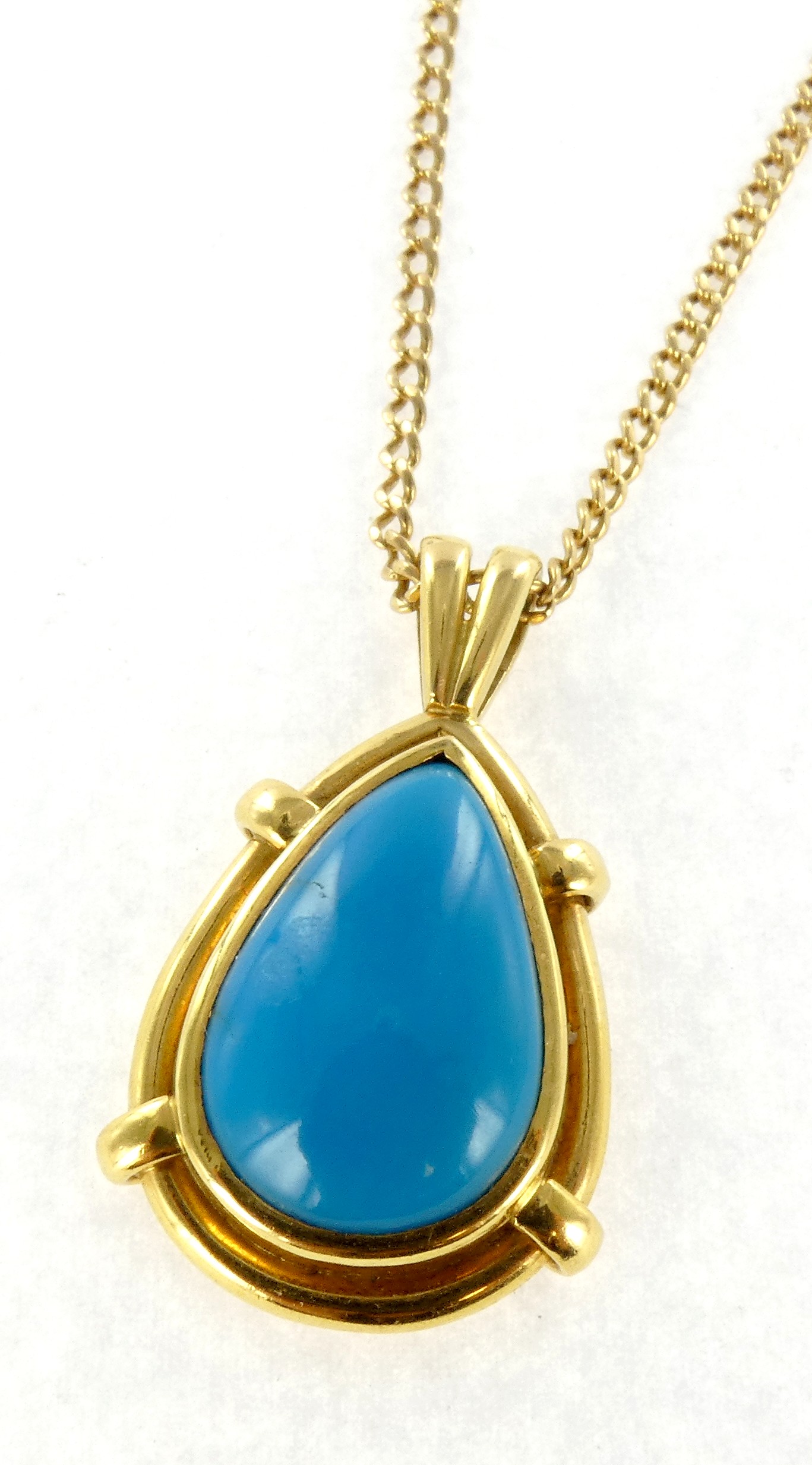 Lot 7 — 1 Pendentif Or 750 mil. Poinçonné, orné d'une turquoise, Bru