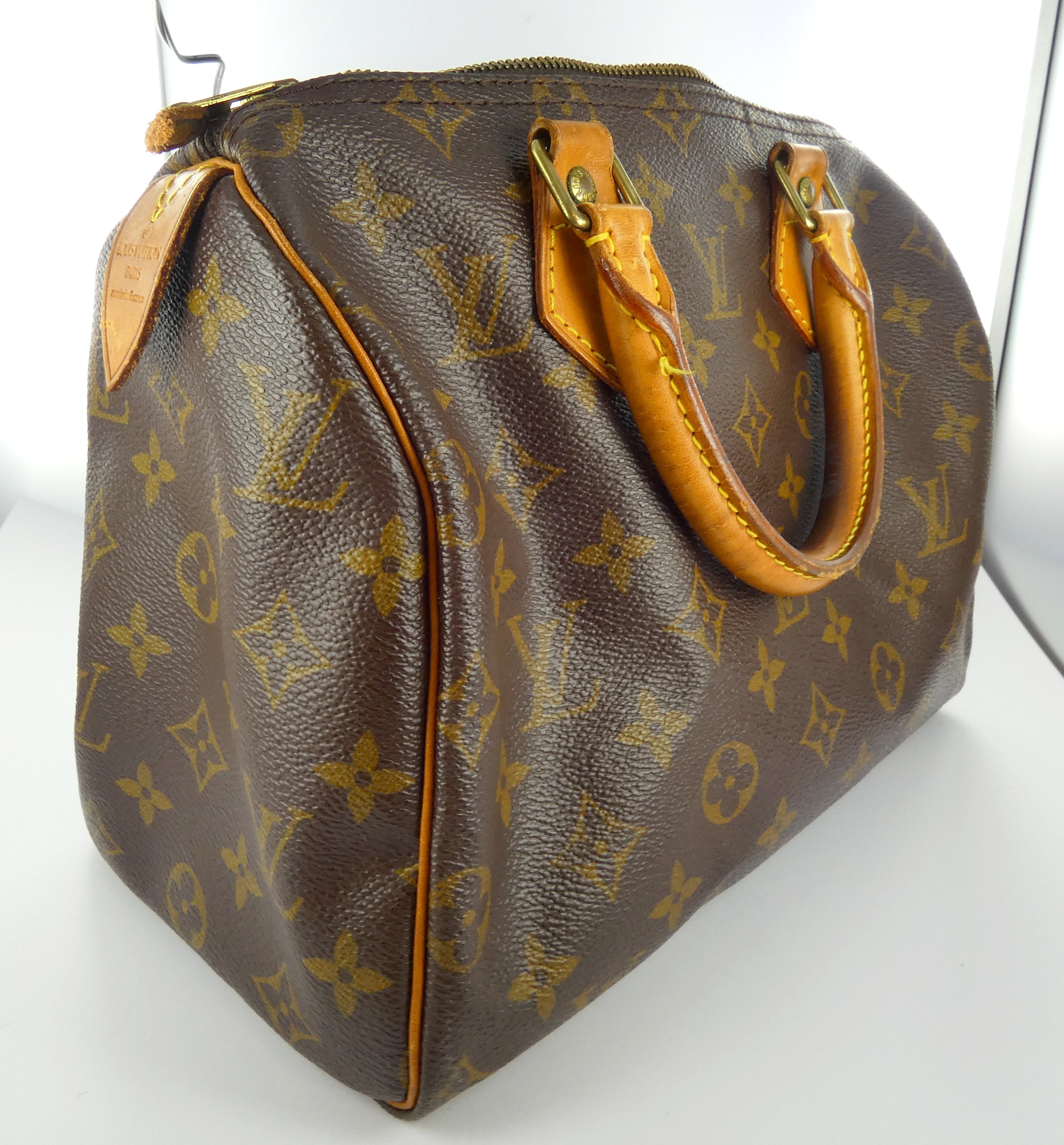 Lot 1 — Louis VUITTON, modéle Speedy 30 : Sac en cuir toile monogram
